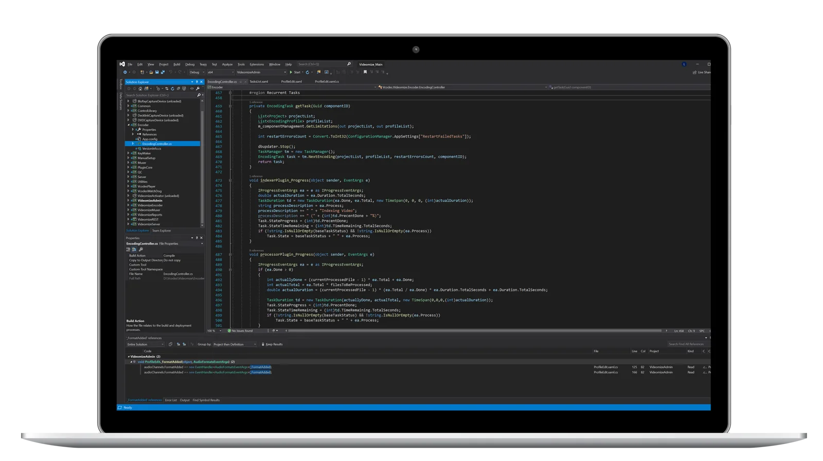 Laptop showing source code for a custom video software project